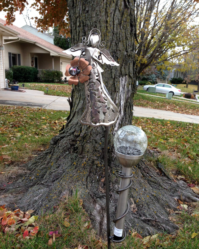 We fell in love with this garden angel yard ornament, which includes a battery-powered solar light. I'd love to look at more products from this seller, but she included no business card with her merchandise, and didn't have any available at her payment station. There is a lesson to be learned here!