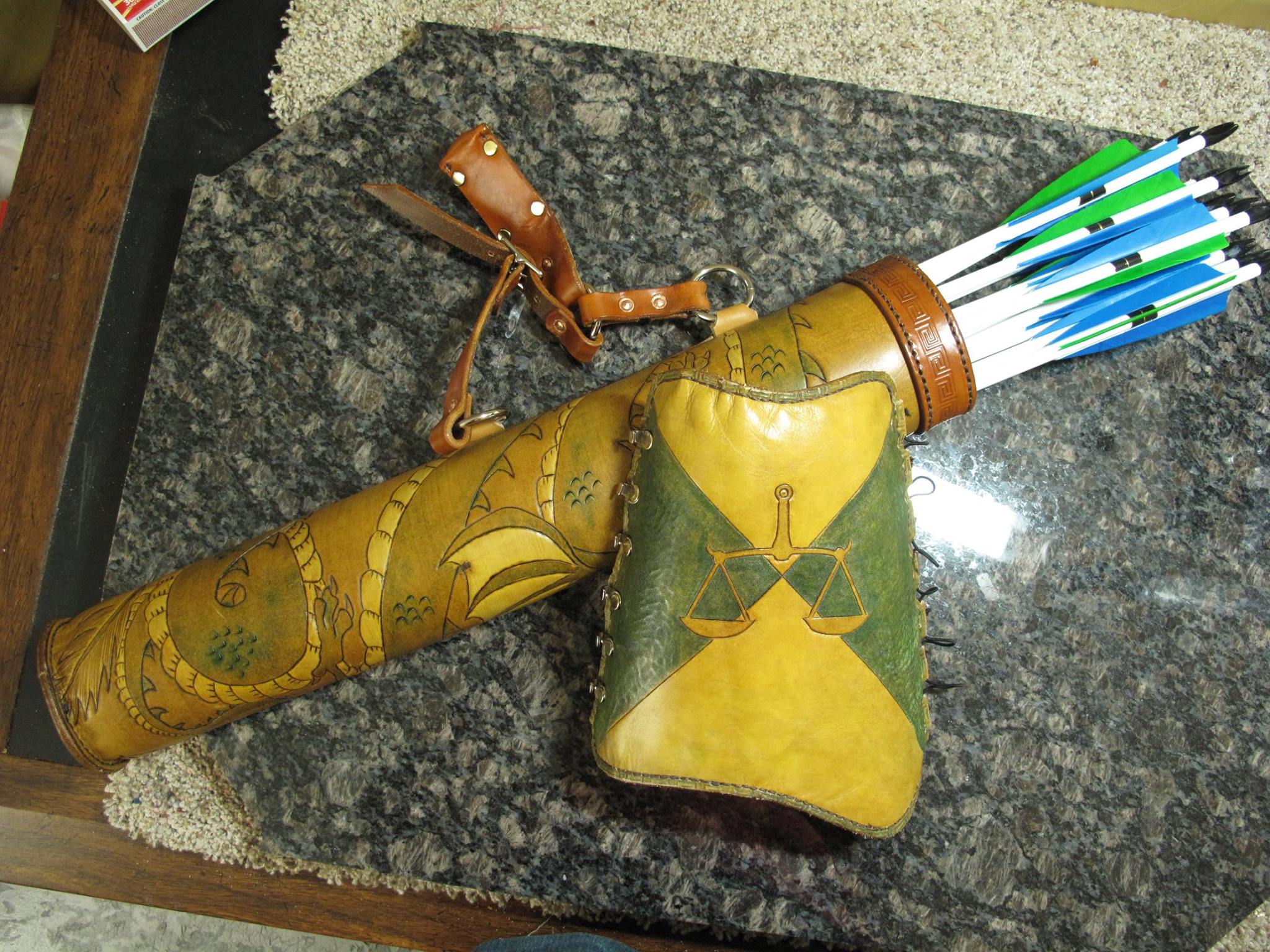 This is a quiver, arm guard and arrows our son, David, recently completed. Interested is custom work from him? Contact him at davnolan88@gmail.com.